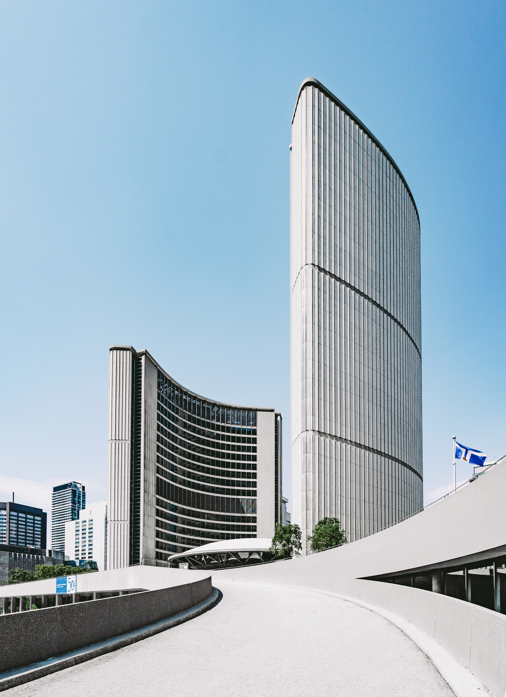 White High-rise Building Near Road